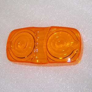 Amber plastic lens for double bubble incandescent marker light