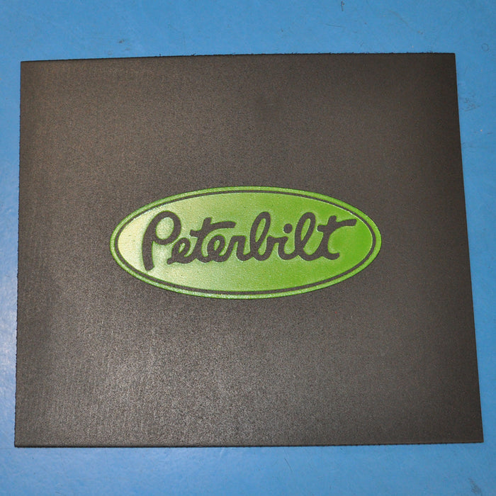 Peterbilt 16" x 14" black front fender mudflap w/green stamped logo