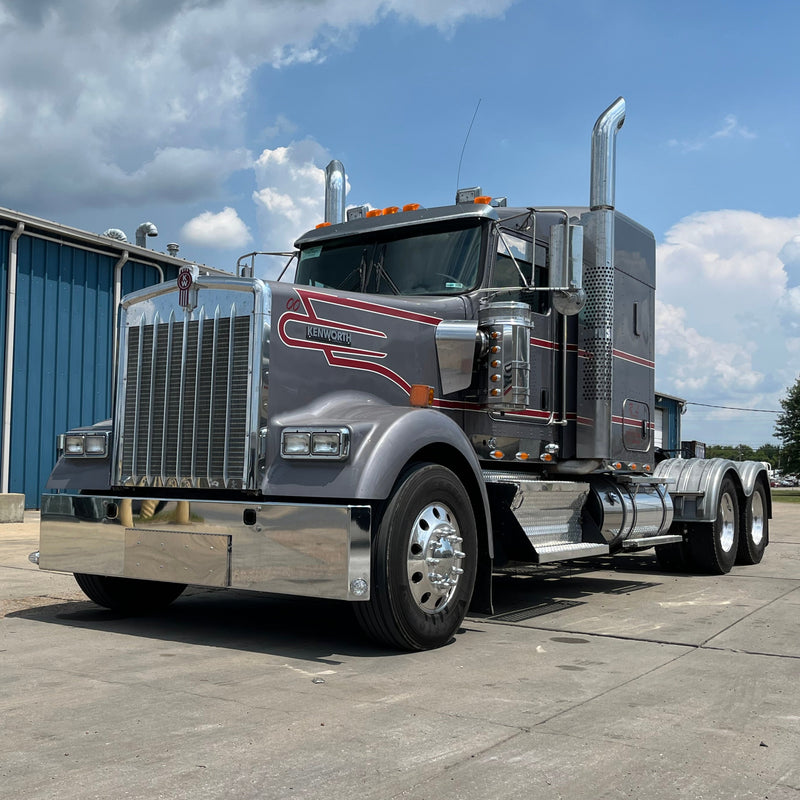 Kenworth W900L chrome bumper with standard tow, center step, & mounting holes