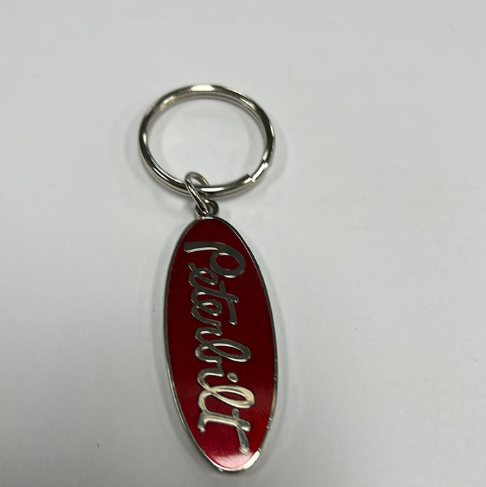 Peterbilt metal oval shaped keychain with red acrylic - SINGLE