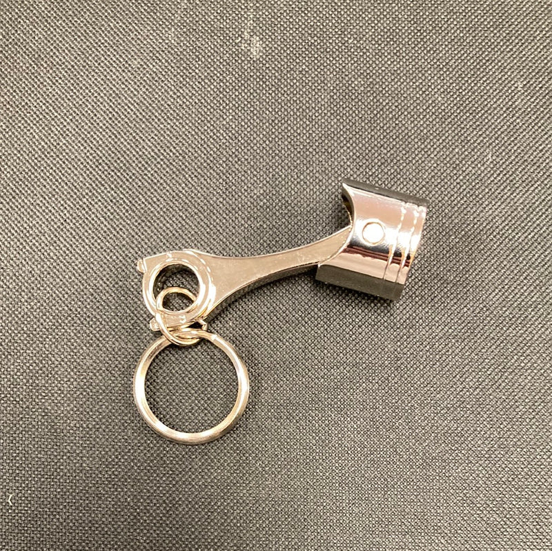 Freightliner piston-style keychain