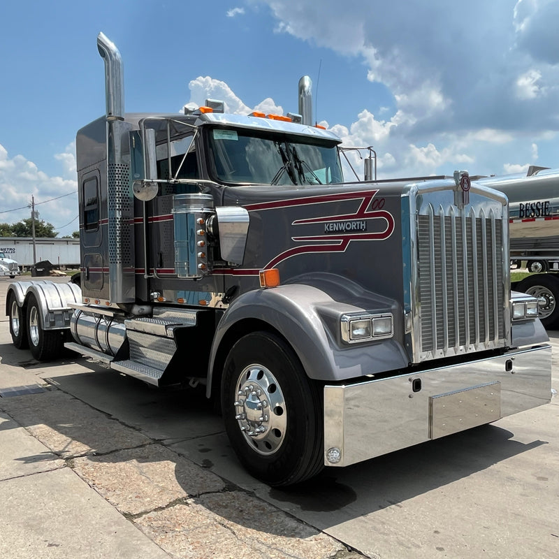 Kenworth W900L chrome bumper with standard tow, center step, & mounting holes