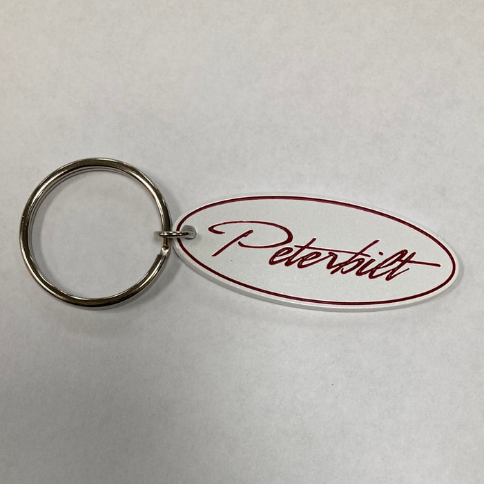 Peterbilt retro white w/fancy script oval logo chrome keychain