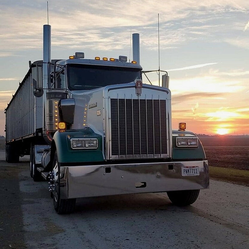 Kenworth W900L chrome bumper with standard tow, center step, & mounting holes