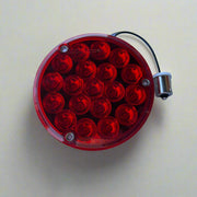 Red 4 inch round rear sleeper replacement light with 1156 plug