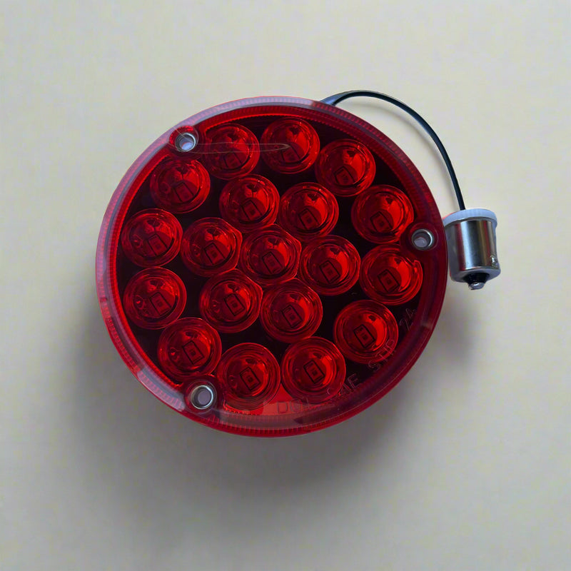 Red 4 inch round rear sleeper replacement light with 1156 plug