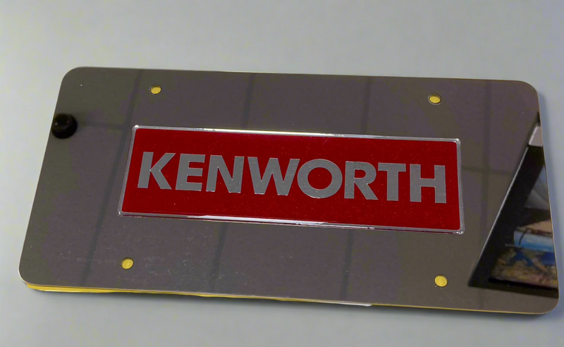 Kenworth stainless steel license plate with red rectangular logo