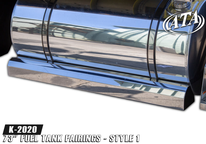 A pair of stainless steel fuel tank fairings for a Kenworth W900 truck, showing a shiny metallic finish with visible seams and contours.