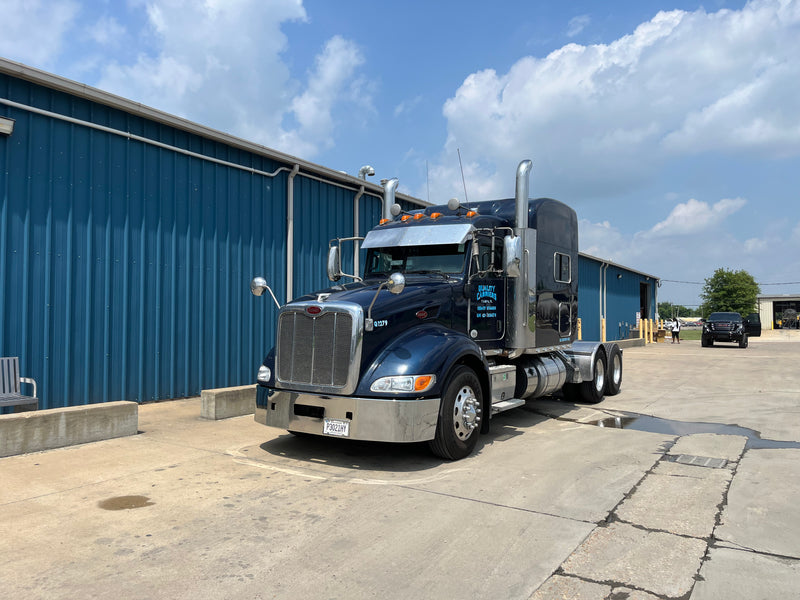 Peterbilt 386 chrome wraparound bumper with tow hook holes