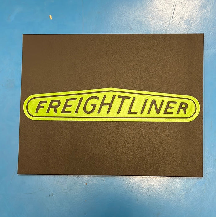 Freightliner 18" x 14" black front fender mudflap w/green stamped logo