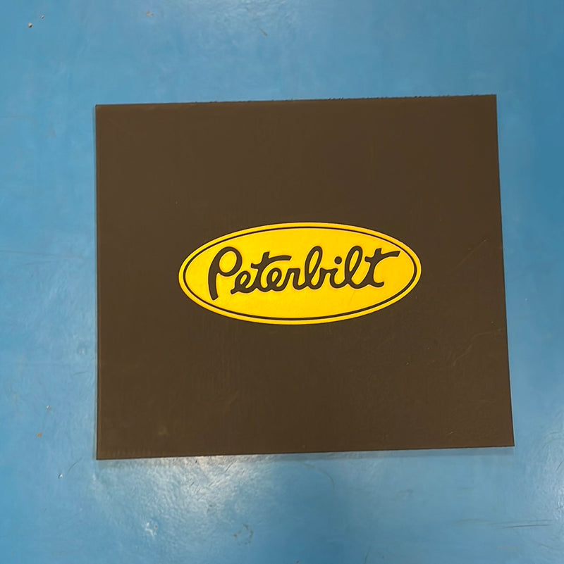 Peterbilt 16" x 14" black front fender mudflap w/yellow stamped logo