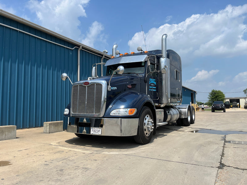 Peterbilt 386 chrome wraparound bumper with tow hook holes