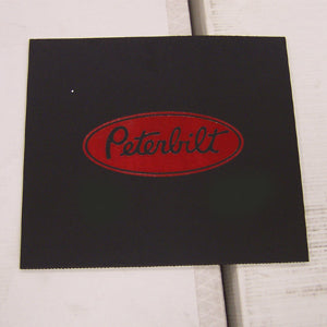 Peterbilt 16" x 14" black front fender mudflap w/red stamped logo