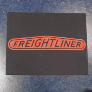 Freightliner 18" x 14" black front fender mudflap w/red stamped logo
