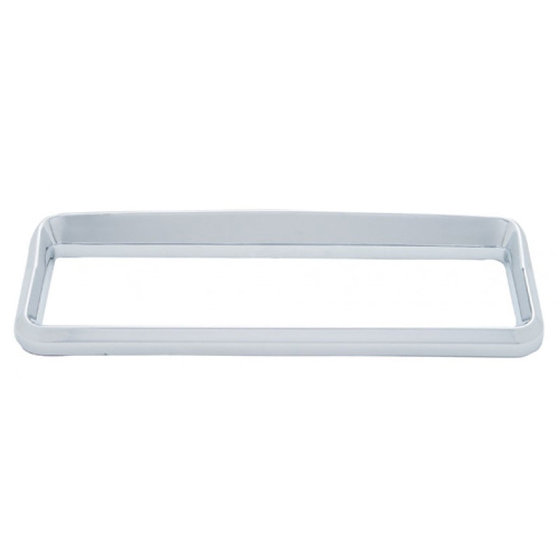 Kenworth chrome plastic "Studio Sleeper" logo bezel w/visor