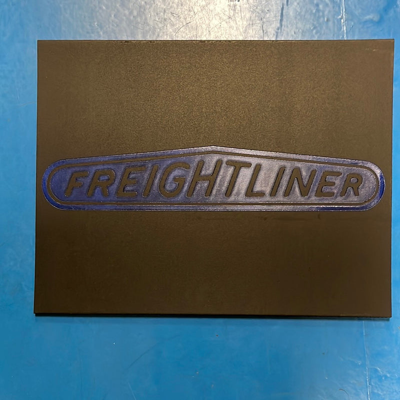 Freightliner 18" x 14" black front fender mudflap w/blue stamped logo