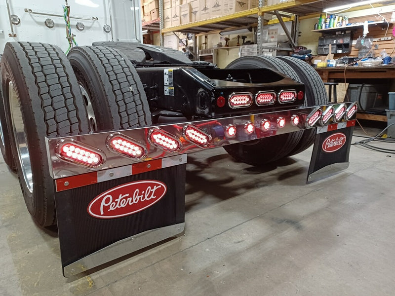 1 piece stainless steel rear mudflap hanger bar w/8 oval, 5 round 2" light holes