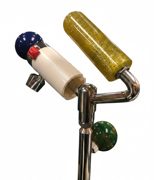 A metal gear shift extension with dual handles and a female base, displayed in a store.